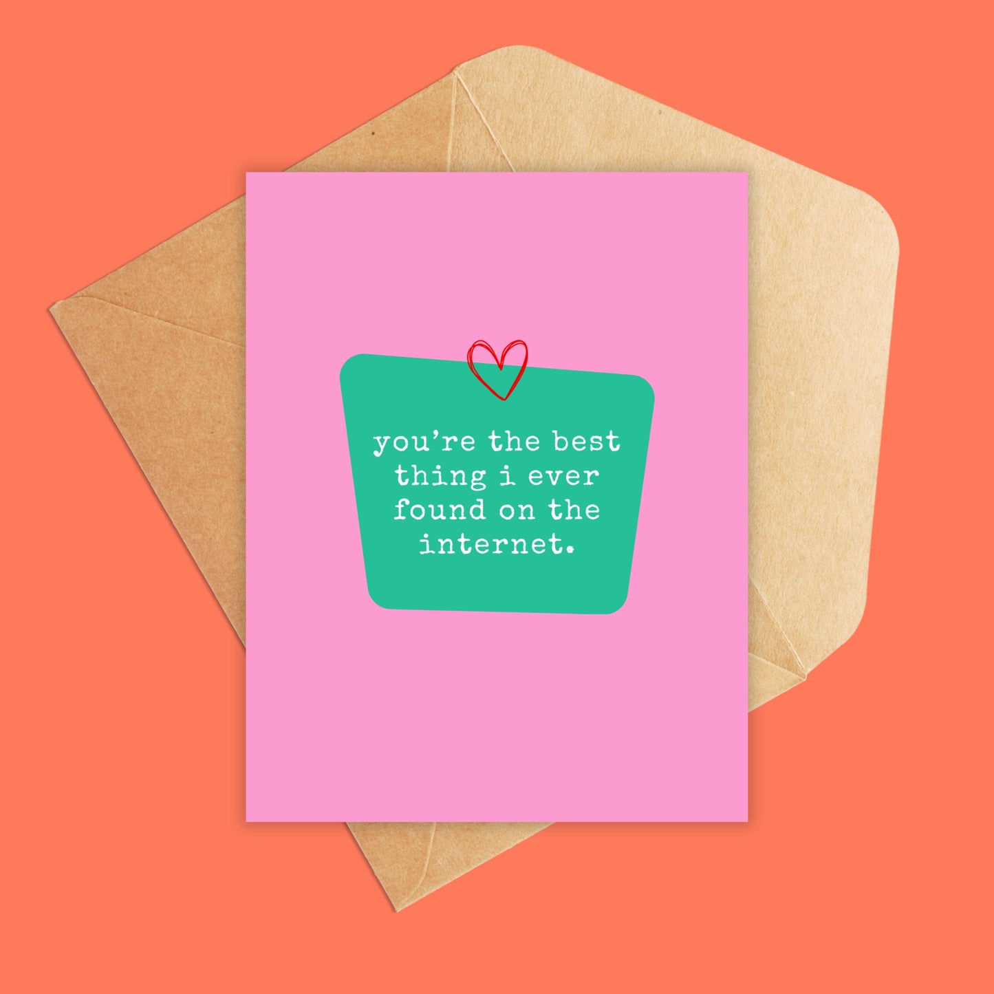 Mockup of Pink greeting card with teal green center box and text inside reads 'you're the best thing i ever found on the internet.' Tiny red heart above text