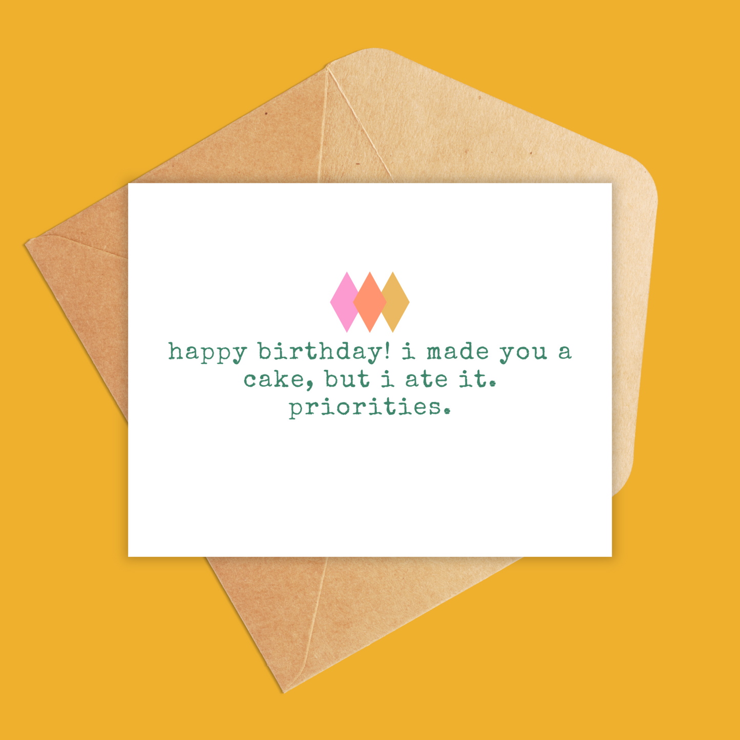 white landscape size card with the text 'happy birthday, i made you a cake, but i ate it. priorities.