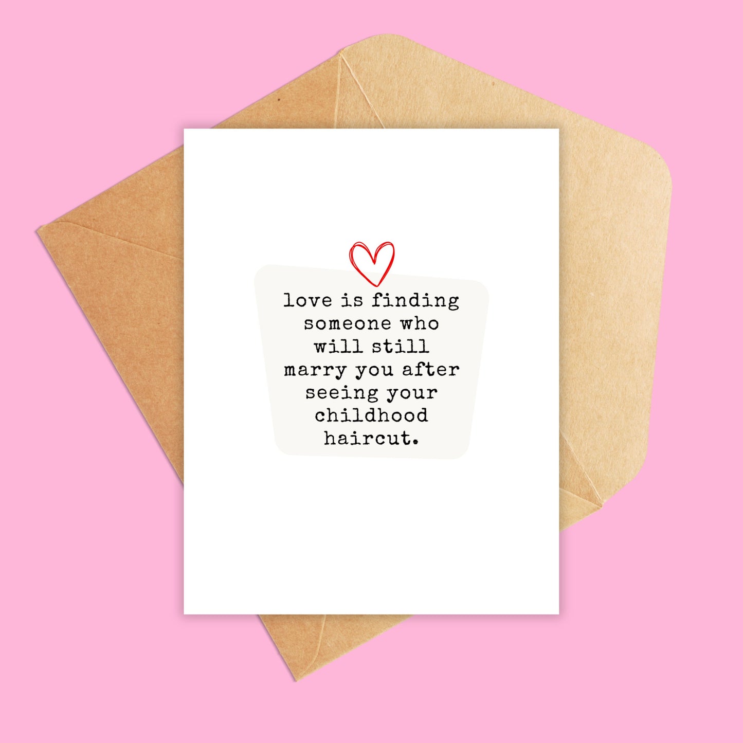 Greeting card shown with brown kraft envelope with heart in the middle and underneath text 'Love is finding someone who will still marry you after seeing your childhood haircut.