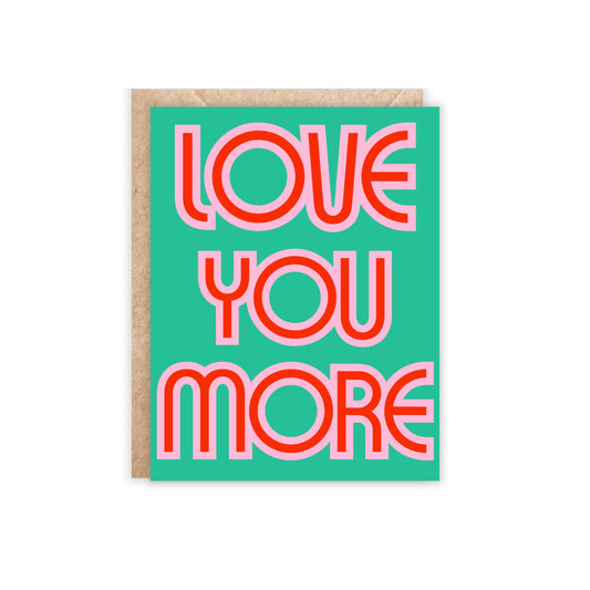 Green card with love you more in big letters in pink and red