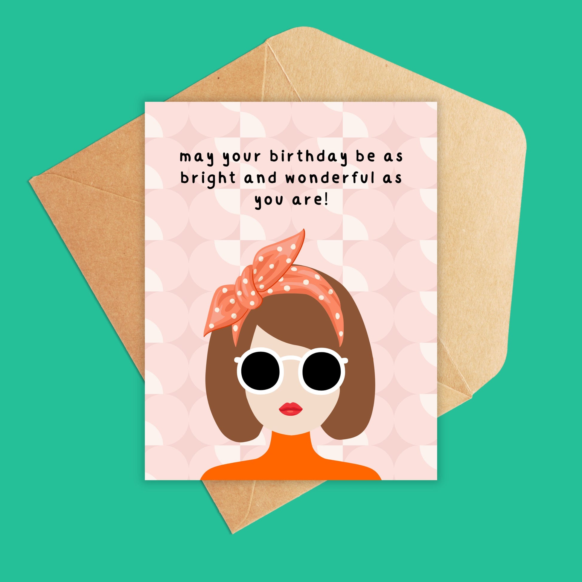 Blush pink background with a girl with brunette hair and white sunglasses, orange headband and shirt. Text reads 'may your birthday be as bright and wonderul as you are.