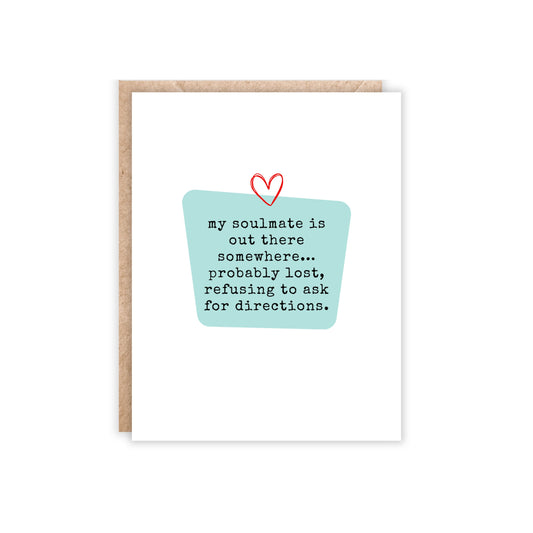 Portrait size greeting card with a blue center block and text reads'my soulmate is out there somewhere...probably lost, refusing to ask for directions.