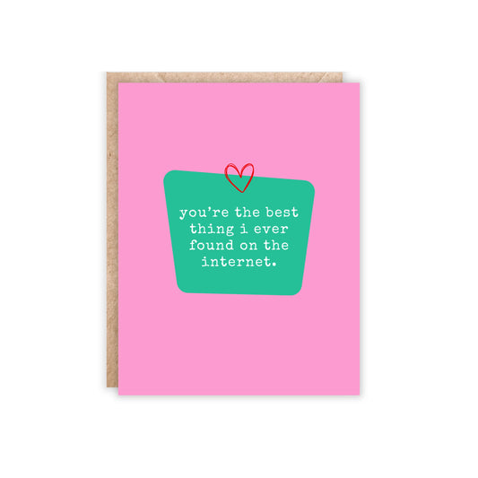 Pink greeting card with teal green center box and text inside reads 'you're the best thing i ever found on the internet.' Tiny red heart above text