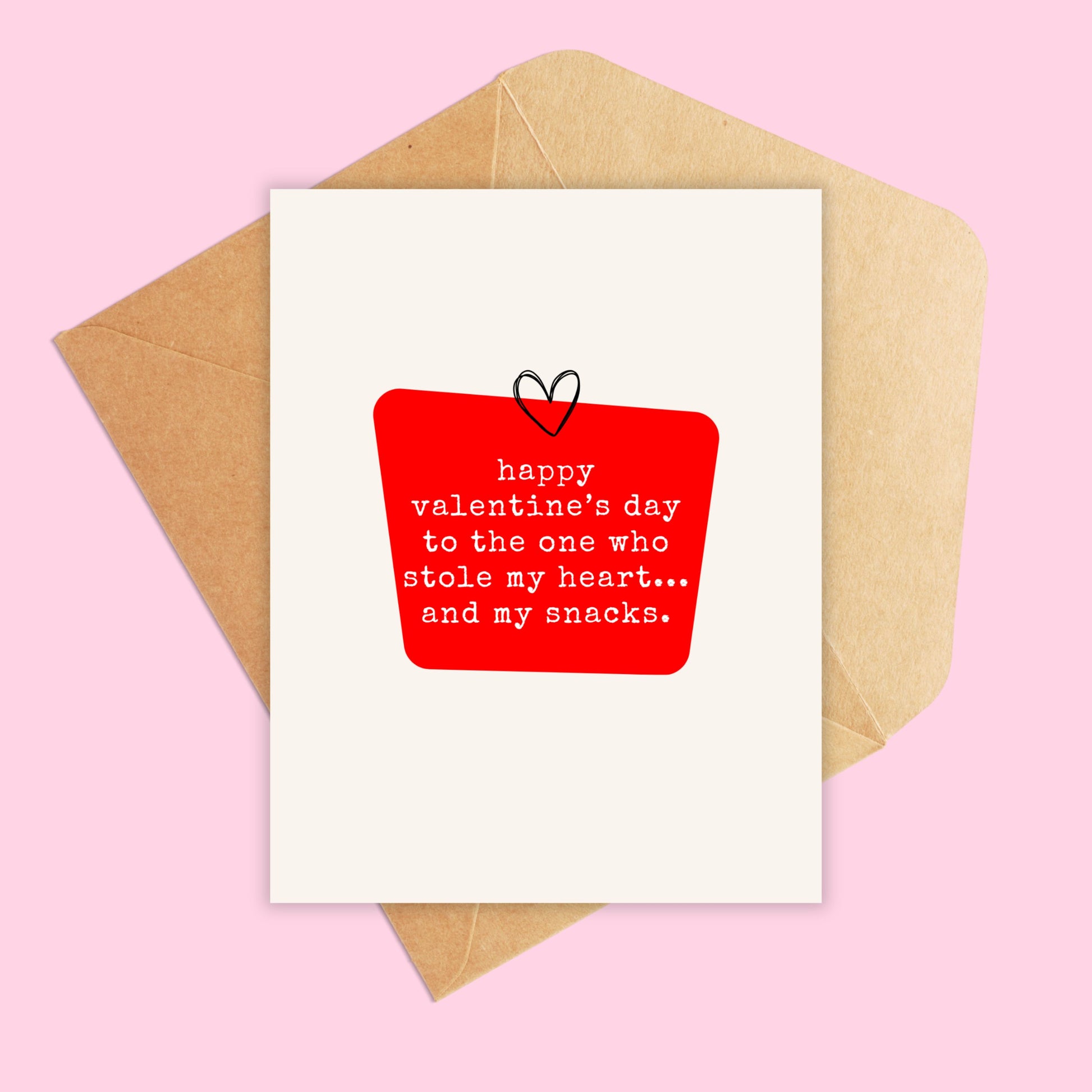Card that reads 'happy valentine's Day to the one who stole my heart...and my snacks'
