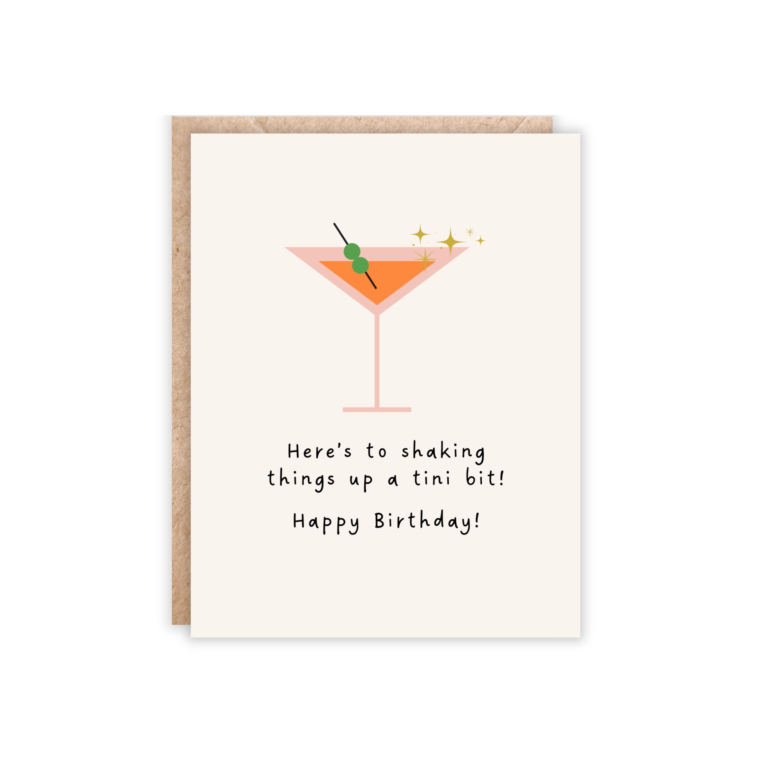 portrait orientation greeting card with a single martini in the colors of blush, orange and green olives thats reads underneath 'here's to shaking things up a tini bit! happy birthday!